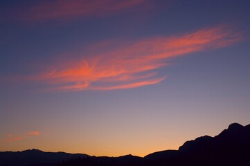 Mountain Silhouette Sunset With Orange Clouds