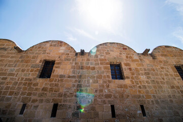 old stone wall of  the building in the sky