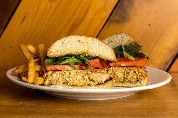 Crab cake sandwich with French fries