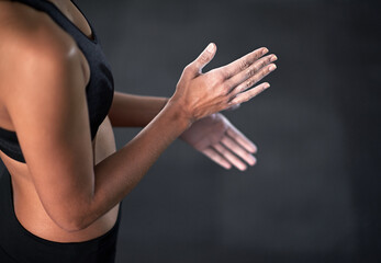 Hands, woman and powder for performance, fitness and strength for training and wellness in gym....