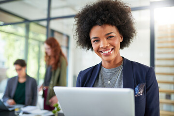 Laptop, research and portrait of business woman in office reading information on internet or online. Technology, smile and professional female creative designer working on computer in workplace.