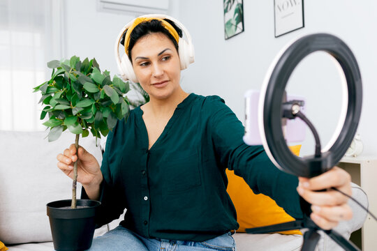 Influencer recording a themed podcast at home