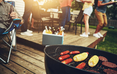 Friends, drinks and bbq with food for dinner, party or reunion with alcohol in America. People, grill and meat for meal at barbecue in backyard, summer and vacation at party, celebration or birthday