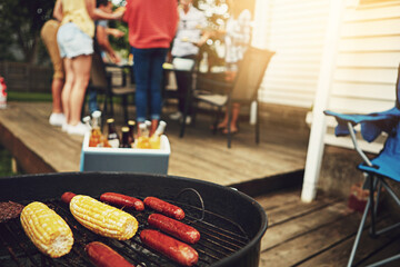 Barbecue, food and outside on weekend with grill for corn, sausage and cooking on porch or...