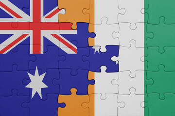 puzzle with the colourful national flag of cote divoire and flag of australia.