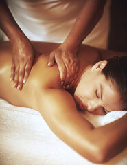 Back, woman and hands for massage in spa for wellness, pamper treatment and hospitality. Peace,...