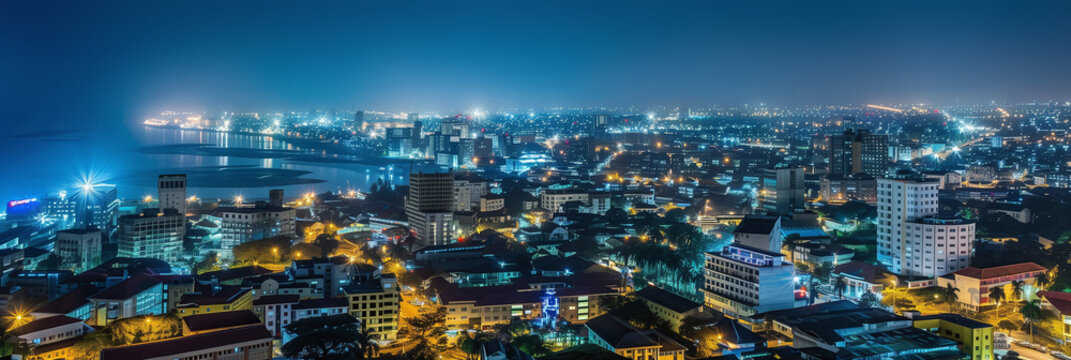 Stylized Night View of Accra with Illuminated Buildings and Coastline