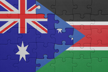 puzzle with the colourful national flag of south sudan and flag of australia.