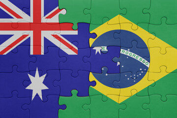 puzzle with the colourful national flag of brazil and flag of australia.