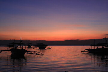 Fototapeta premium sunset in maolboal in philippines