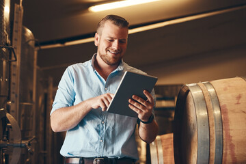 Portrait, man and happy with tablet in brewery as manager with pride on product, process and...