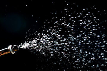 water spray from a watering can