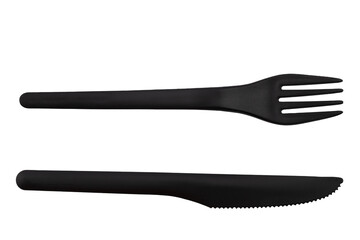 disposable table knife made of black food-grade plastic, insulated on a white background