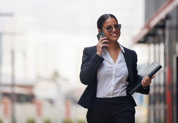 Business, commute and woman with phone call in city, morning and networking chat to client. Consulting, attorney and virtual conversation on street with smartphone at court to contact with news