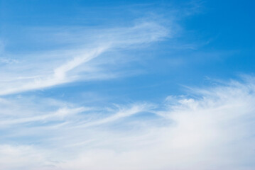 gentle clouds in the blue sky