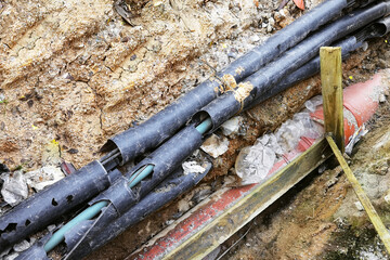 broken pipes at construction site on city streets to change with new ones