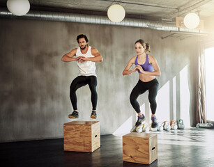 Jump, workout and couple in gym with box, power and training at fitness challenge together. Man,...