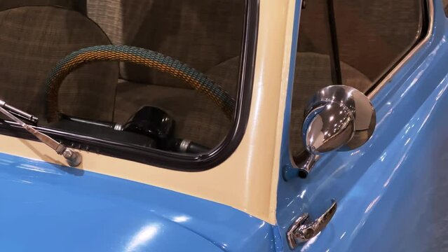 Retro 1960s Two-Tone Mid-Range Vintage Car: Up-Close Blue and Beige Classic with Chrome Details