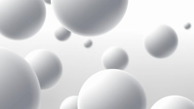 White spheres moving on a light background