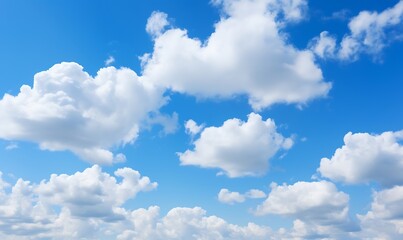 Naklejka na ściany i meble White clouds against blue sky background