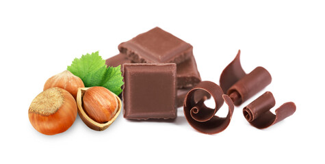 Milk chocolate and hazelnuts isolated on white