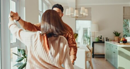 Love, dance and couple in home for fun, bonding and loving relationship in living room. Dating, marriage and happy man and woman dancing together for relaxing, listening to music and enjoy weekend