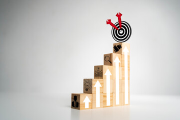 Woods block step on table with icon Action plan. target icon on the top of wooden cube blocks.