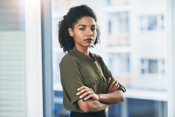 Businesswoman, portrait and arms crossed at office window as corporate professional, financial...