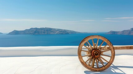 wooden cart wheel on white roof of Santorini with blue sea in the background,