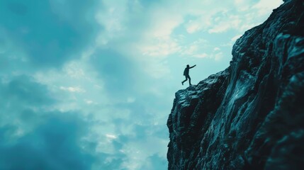 A silhouette of a person jumping on the edge of a rocky cliff with a cloudy sky in the background.