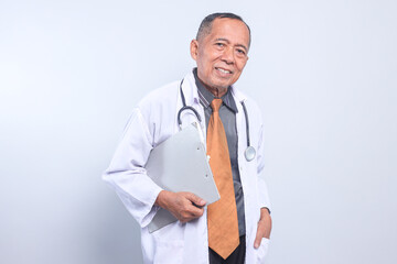 Potrait Of Confident Senior Asian Doctor Male Holding Medical Record Isolated On White Background