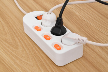 Electrical plug in outlet socket at home isolated on on wooden table, Outlet, Electric Plug, Power...