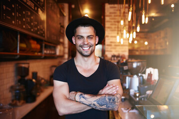 Happy, portrait and businessman with arms crossed at cafe for friendly, welcome or customer service...