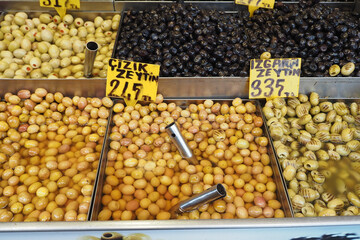 Buckets of olives for sale street food market