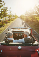 Old couple, road trip and convertible driving in countryside vineyard for retirement travel,...