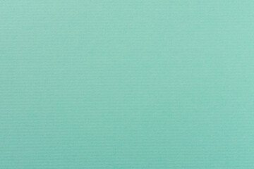 縞模様が入った水色の紙のアップ