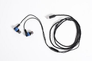 Black modern headphones with a headset isolated on white background. concept of digital music