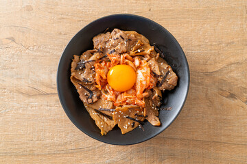 pork bulgogi rice bowl with kimchi and Korean pickled egg