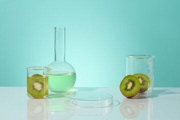 Concept scene stage showcase for new product with a glass podium decorated with several glassware and fresh kiwi cut in halves. Kiwis stimulate your collagen and elastic levels