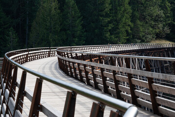 A train trestle spanning a deep gorge refurbished into a walking path part of Canada's coast to...