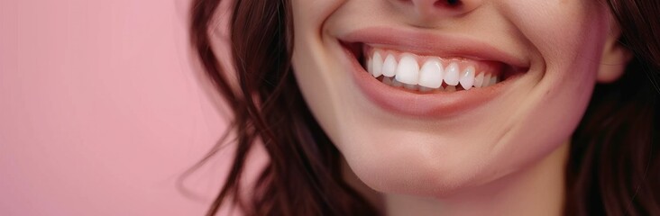 Obraz premium Beautiful smile with white teeth for tooth whitening on pink background, close up beauty concept