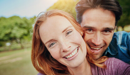 Park, selfie and happy couple hug in nature with love, fun and bonding on travel, date or anniversary outdoor. Support, portrait and people embrace in forest with trust, care and gratitude in Canada