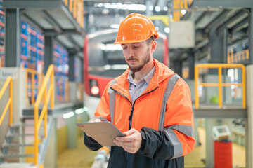 Portrait of a male engineer Take care of the electric locomotive maintenance shop