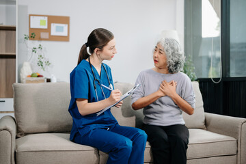 Doctors explain the use of medication to patients. Medical doctor holing senior patient's hands and...