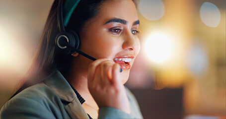 Happy woman, call center and communication with headphones at night in office for customer service...