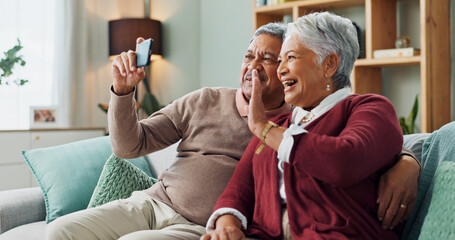 Senior couple, laugh and smartphone for video call, contact and communication in living room....