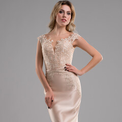 Pretty girl in luxurious evening dress shot