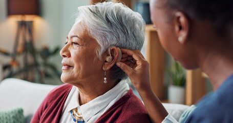 Nurse, woman and hearing aid on ear for medical support, wellness and innovation of disability....