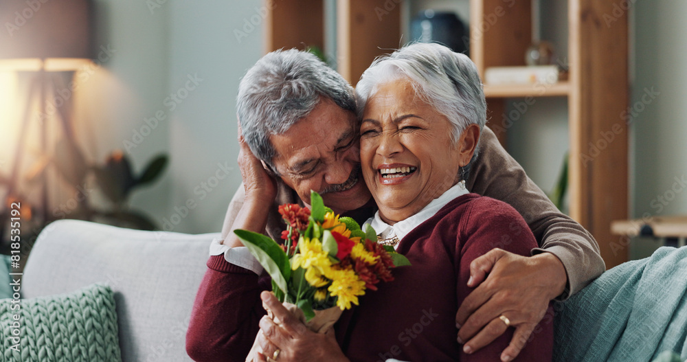 Poster Couple, woman and old man with gift of flowers on sofa or couch, happy and living room of house. Senior, male person and partner with surprise for love, smile and happiness in home and retirement