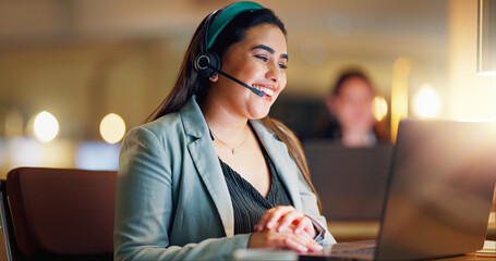 Happy woman, call center and communication with headset at night in office for customer service,...